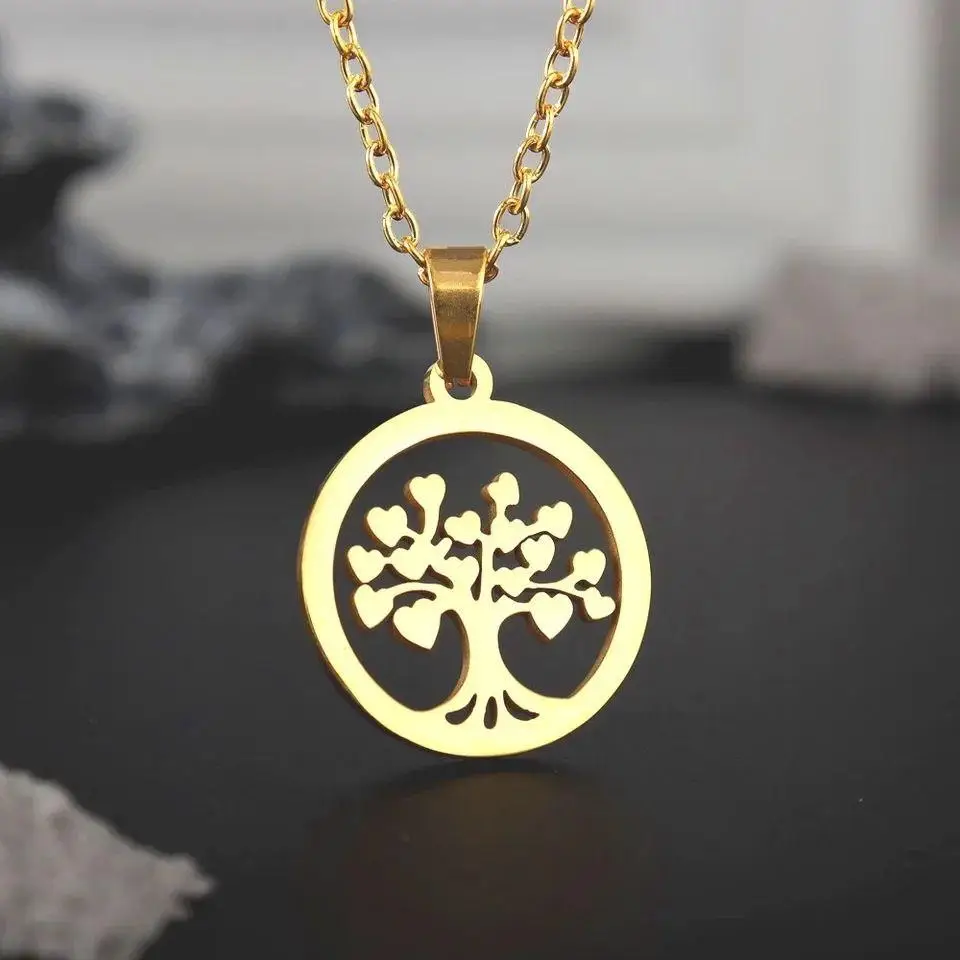 Gold-plated round tree of life pendant with heart-shaped leaves