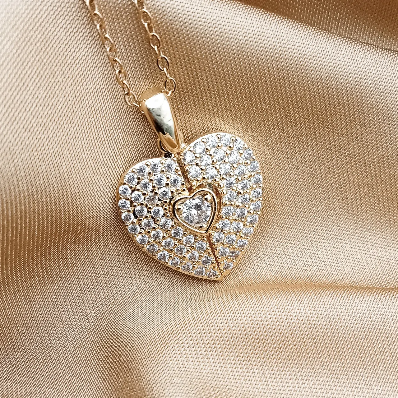 Rose gold heart pendant set with clear cubic zirconia stones